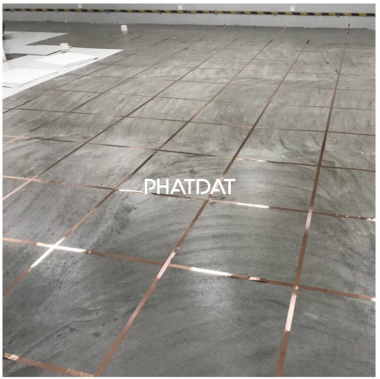 trải lá đồng sàn esd tile huajing
